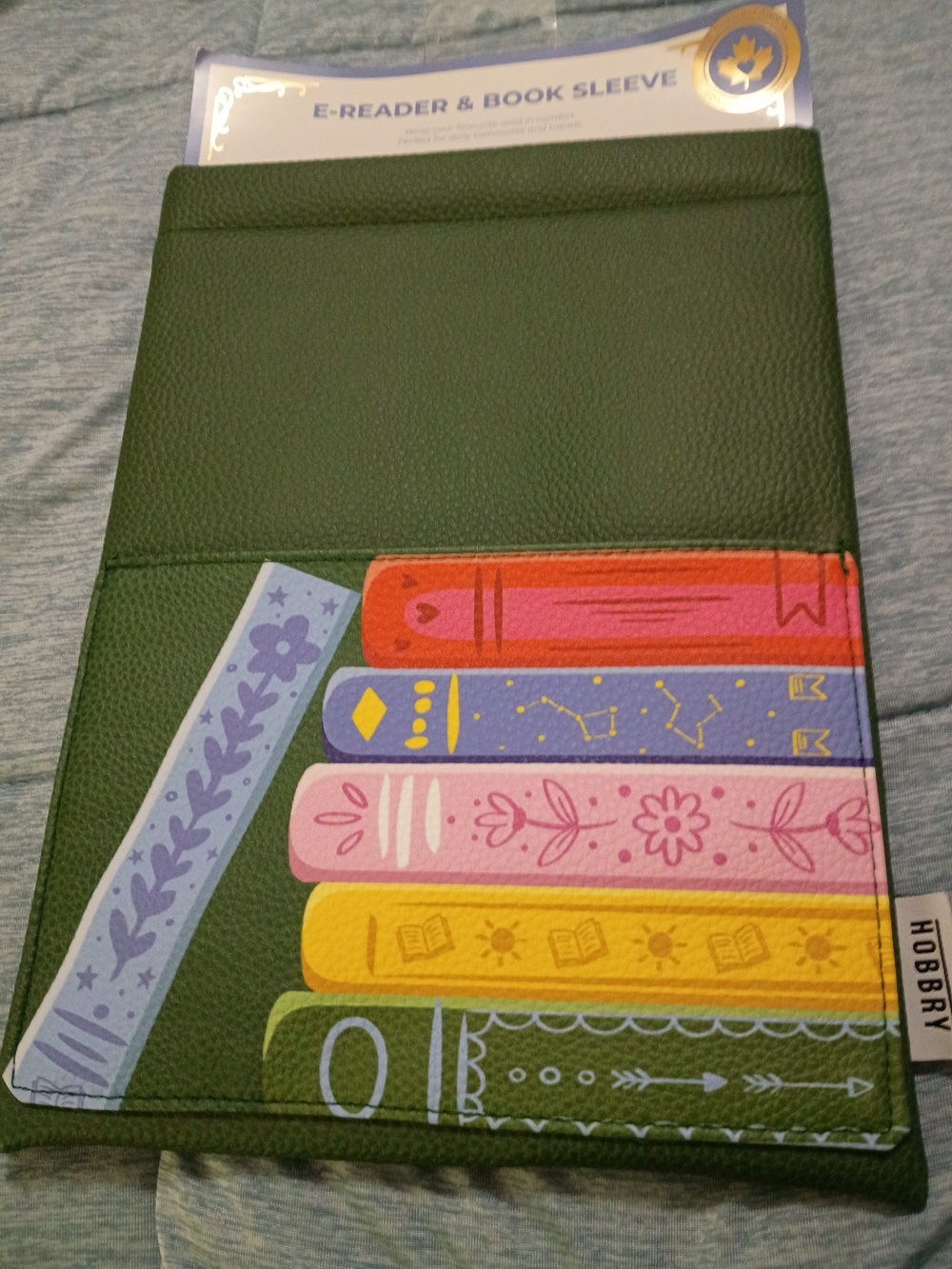 Green Tablet Sleeve with Colorful Book Illustration